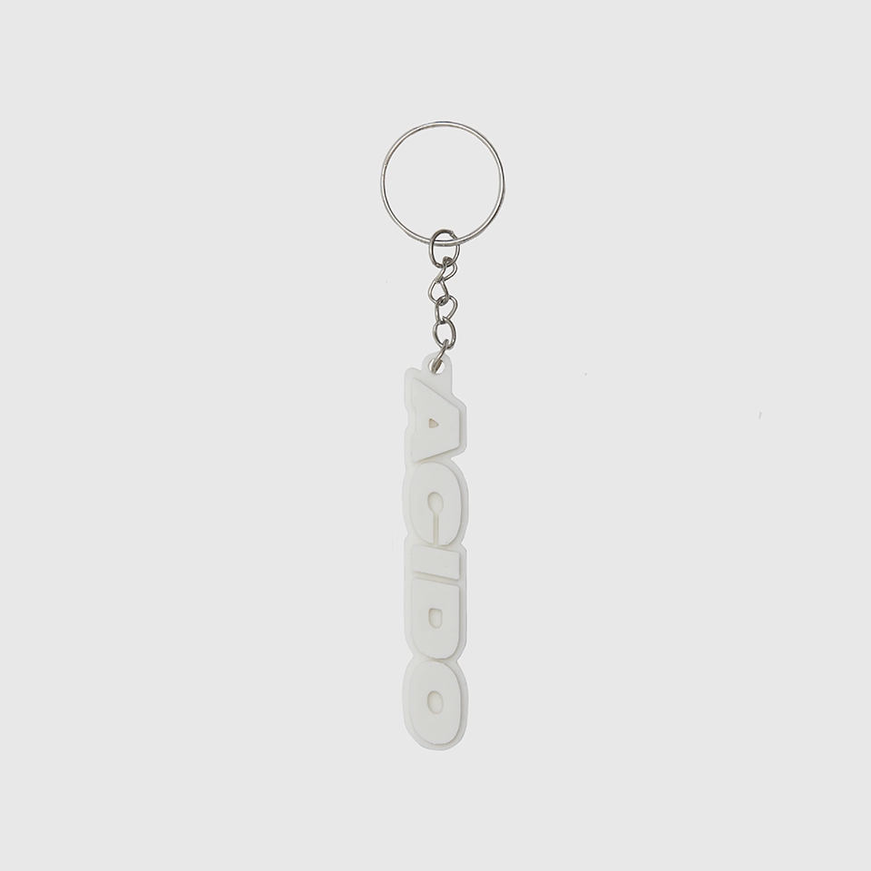 Portachiavi bianco con il logo 'ACIDO' in rilievo, design verticale.