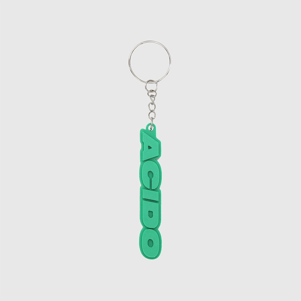 Portachiavi verde con il logo 'ACIDO' in rilievo, design verticale.